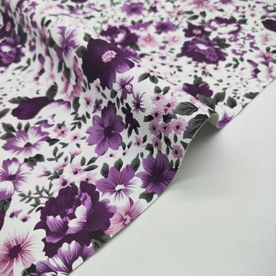 Des fleurs colorées imprimées en PVC PU en faux cuir synthétique