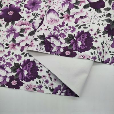Des fleurs colorées imprimées en PVC PU en faux cuir synthétique