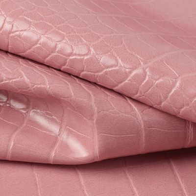 Tissu en cuir faux en PVC avec motif animal 137 cm de largeur et double dosage.