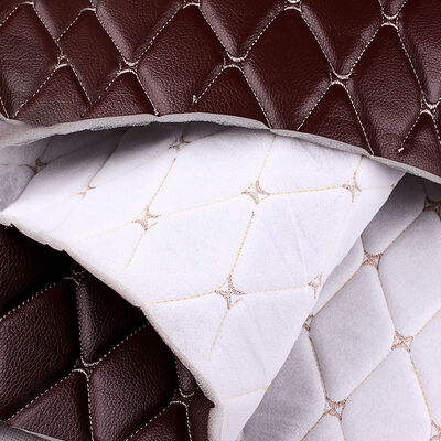 Couverture personnalisée en PVC en cuir synthétique de 7,0 mm d'épaisseur brodée en relief en mousse de polyuréthane élastique pour sièges d'auto