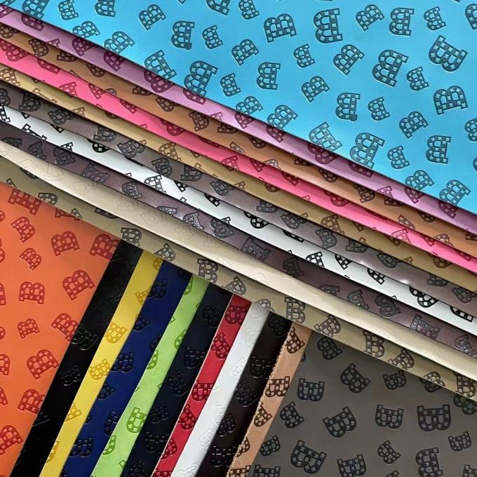 Personnaliser le cuir synthétique gaufré à changement de couleur PU Vinyl pour chaussures, sacs, tapis de table, tissu en similicuir 14